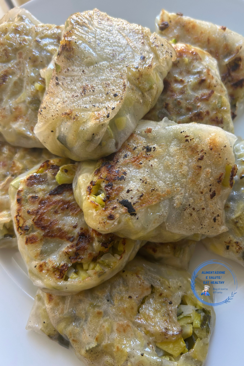 IInvoltini di carta di riso croccanti con zucchine in padella