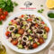 Insalata Estiva con Totano, Zucchine, Pomodorini e Olive: Ricetta Fresca e Leggera