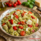 Insalata di Riso con Pesto di Basilico, Pomodorini e Scaglie di Parmigiano