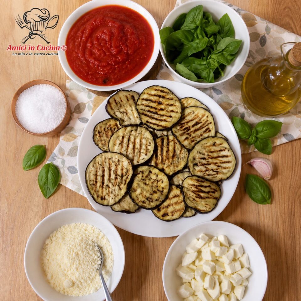 Ingredienti per preparare la parmigiana di melanzane non fritte al forno