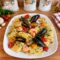 Paccheri con gamberi, cozze e pomodorini confit