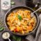 Pasta con zucca e scamorza filante