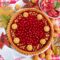 Crostata al melograno e amaretti: il dolce autunnale dal cuore rosso rubino