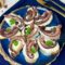 CROSTINI DI POLPO FILANTI AL FORNO