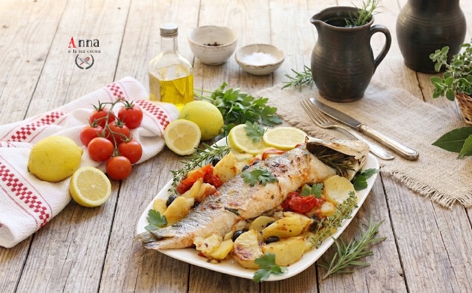 Branzino o spigola al forno con patate pomodorini e olive