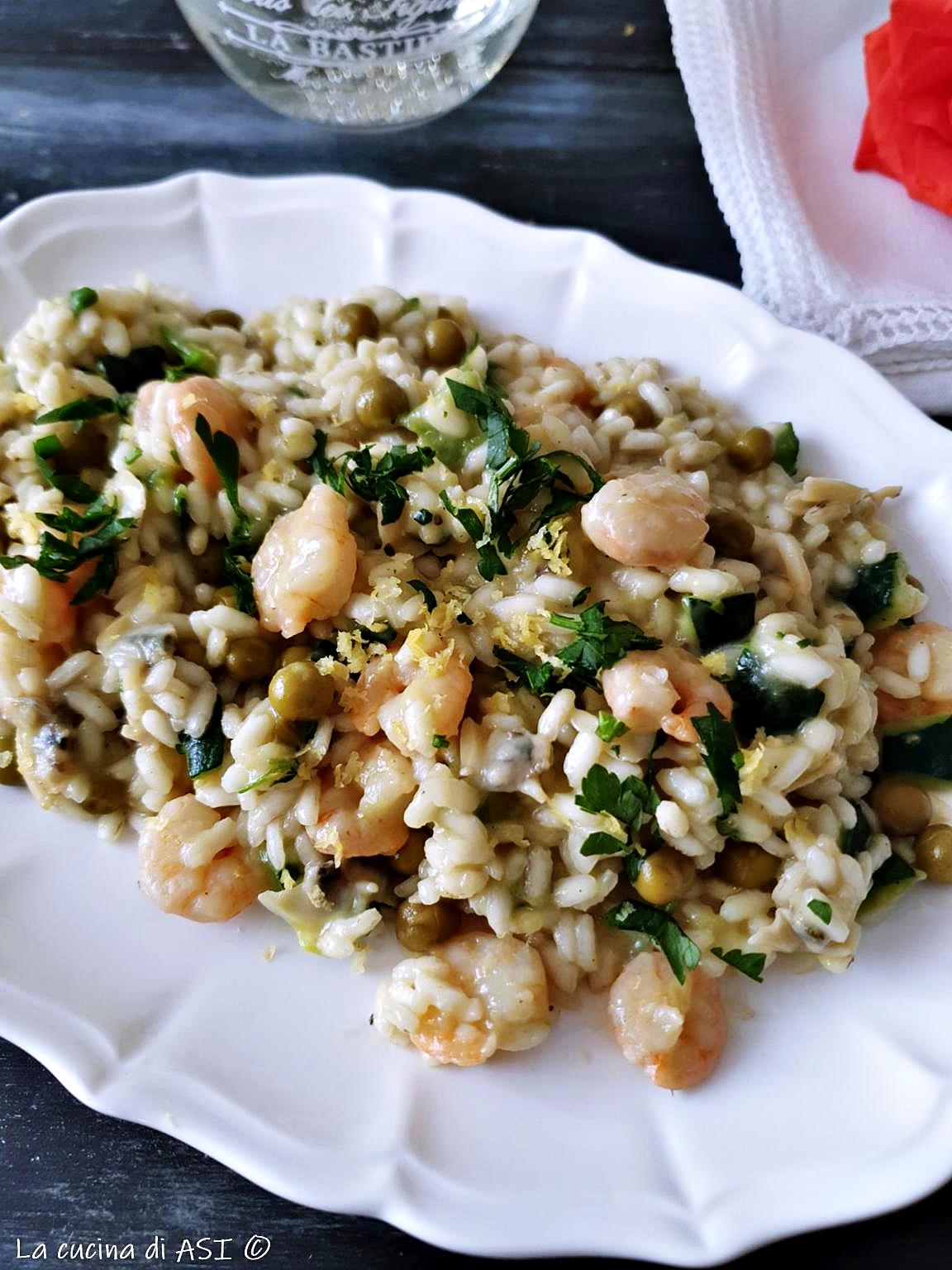Risotto con gamberetti vongole zucchine al profumo di limone