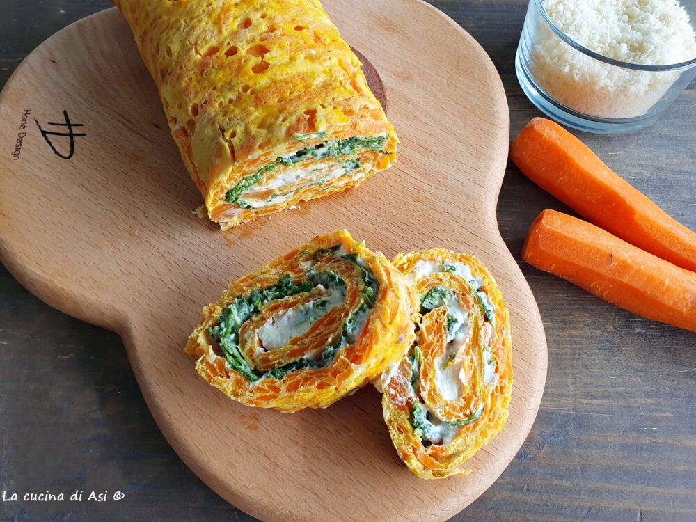 rotolo a fette di carote grana uova e farcito con rucola e formaggio spalmabile