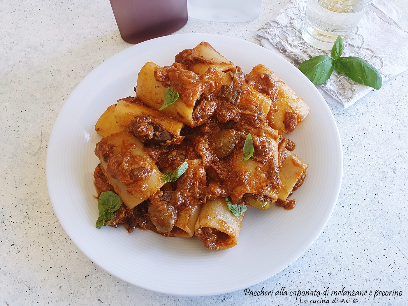 Paccheri con caponata di melanzane e pecorino