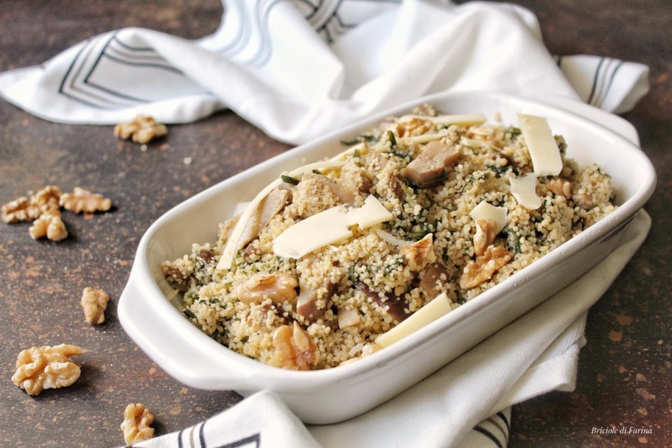 Cous cous integrale con porcini cicoria scaglie di parmigiano e noci