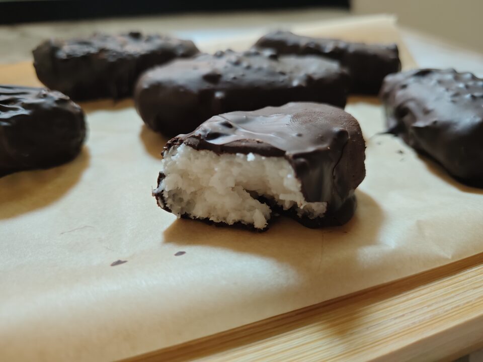 Homemade copycat Bounty vegan bars with dark chocolate and coconut
