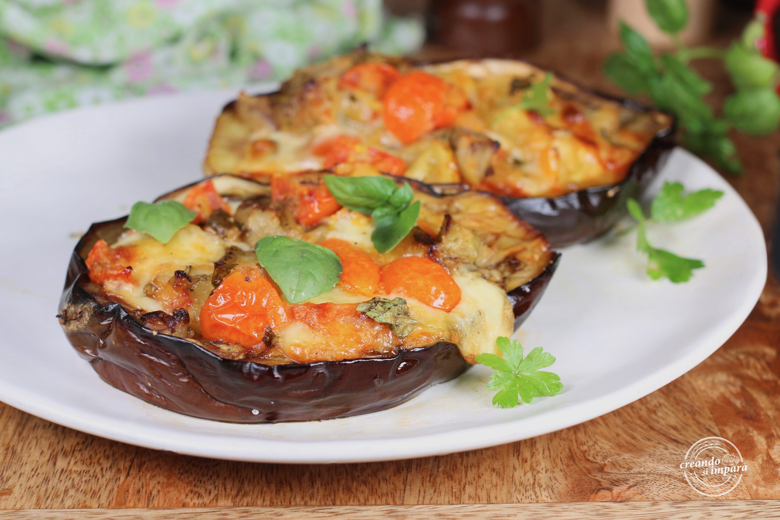 melanzane farcite con pomodoro e mozzarella