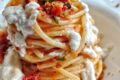 Spaghettoni con pomodori secchi, muddica atturrata,crema di tuma e Nduja.