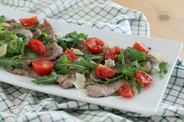 Scaloppine con rucola e pomodorini