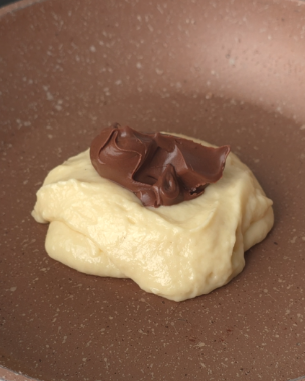 unite un cucchiaio di nutella