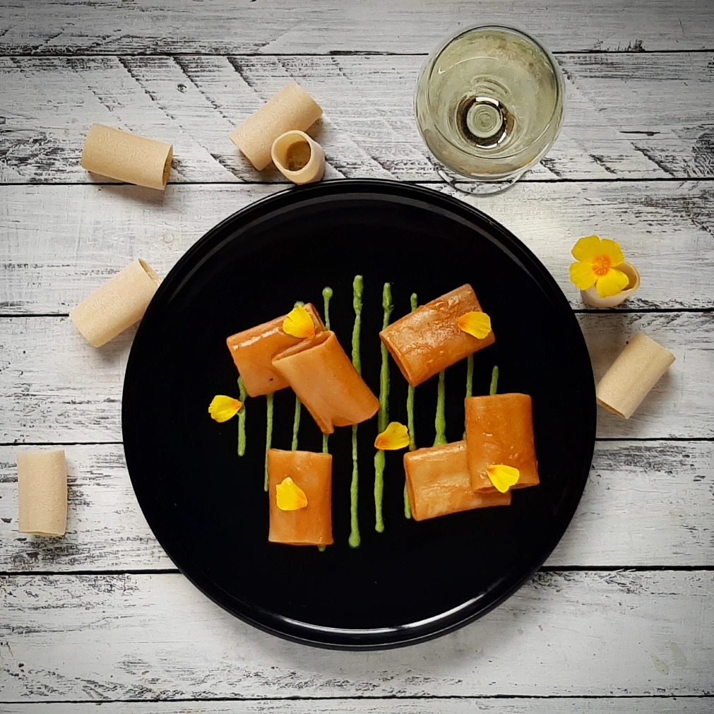 Paccheri con bisque di gamberi e crema di piselli cucinato e mangiato
