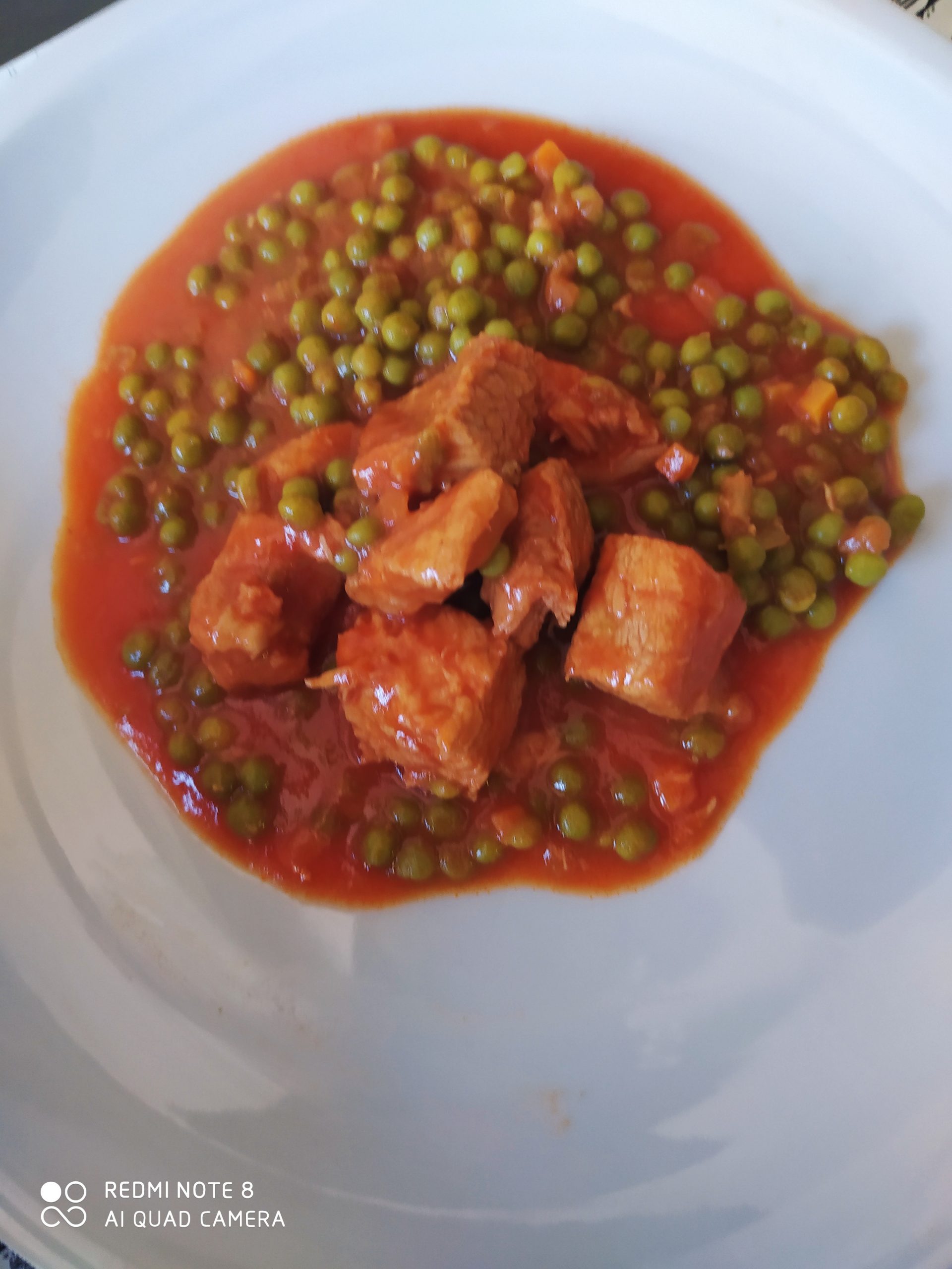 spezzatino con piselli e sugo