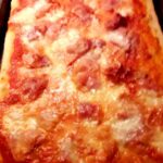 Pizza con prosciutto cotto e parmigiano