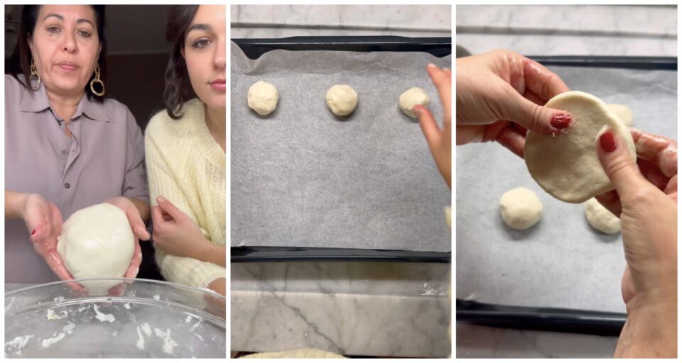 Quando avremo ottenuto un panetto liscio, ricaviamo da questo delle pallette del peso di 60 g l'una. Poggiamole su una teglia rivestita di carta forno e poi con le mani le modelliamo e le diamo la forma delle focaccine.