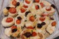 Anelli di totano al forno con pomodorini e olive taggiasche