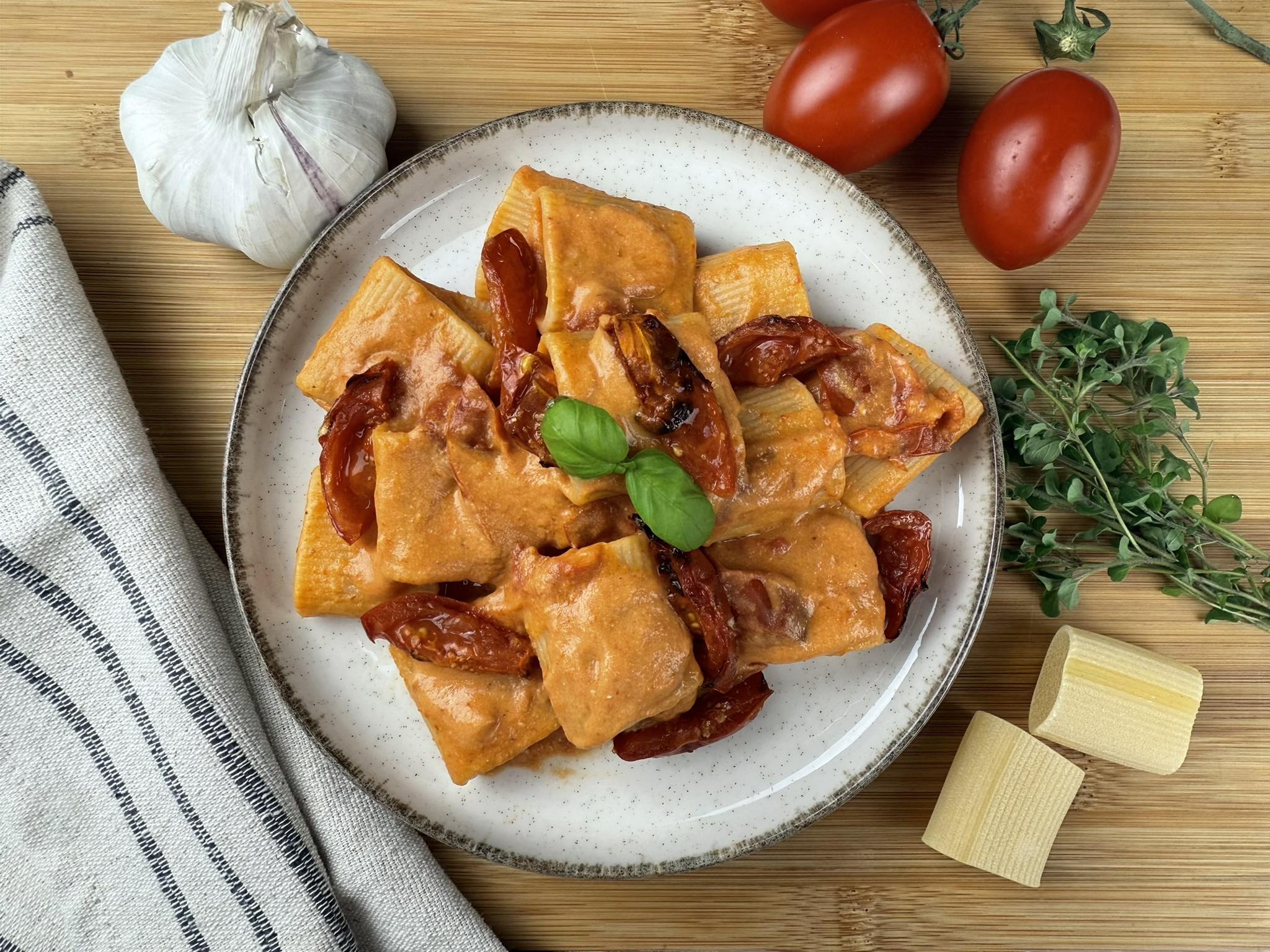 Ricetta paccheri con crema di pomodori confit e burrata