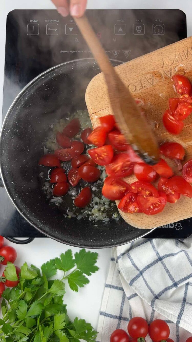 Pasta con bisque di gamberi
versa i pomodori