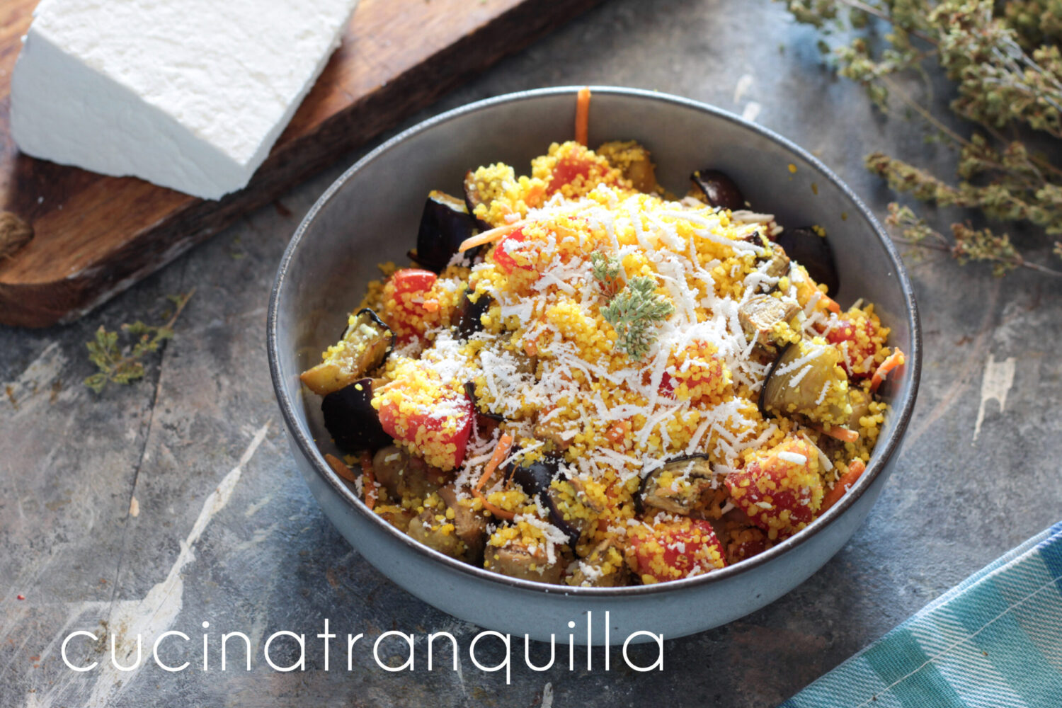 Couscous con melanzane cotte in friggitrice e ricotta salata