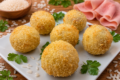 Supplì con cotto e mozzarella: il segreto per un fritto perfetto e filante a casa tua! 🧀🔥