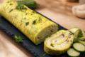 Rotolo di zucchine e scamorza: la ricetta furba e filante pronta in un lampo! 🥒🧀