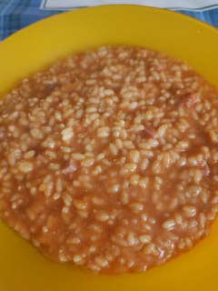 Risotto al pomodoro con speck e gorgonzola
