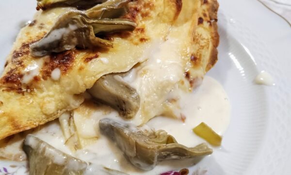Crespelle con carciofi e salsiccia