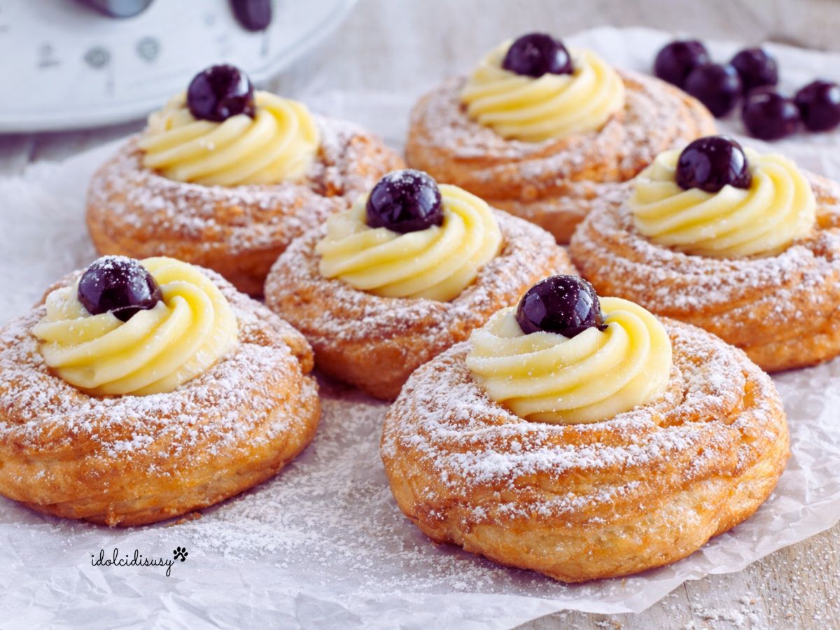 zeppole di san giuseppe bimby fritte con crema pasticcera e amarene, soffici e dorate spolverate con zucchero a velo