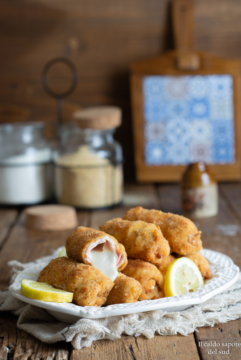 Involtini di lonza con prosciutto e formaggio fritti