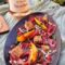 Carpaccio di carne salada con pesche grigliate