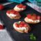 Bruschette con fiocchi di latte e pomodorini datterini
