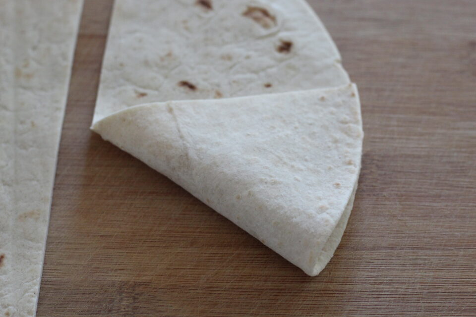 piegare la piadina a triangolo