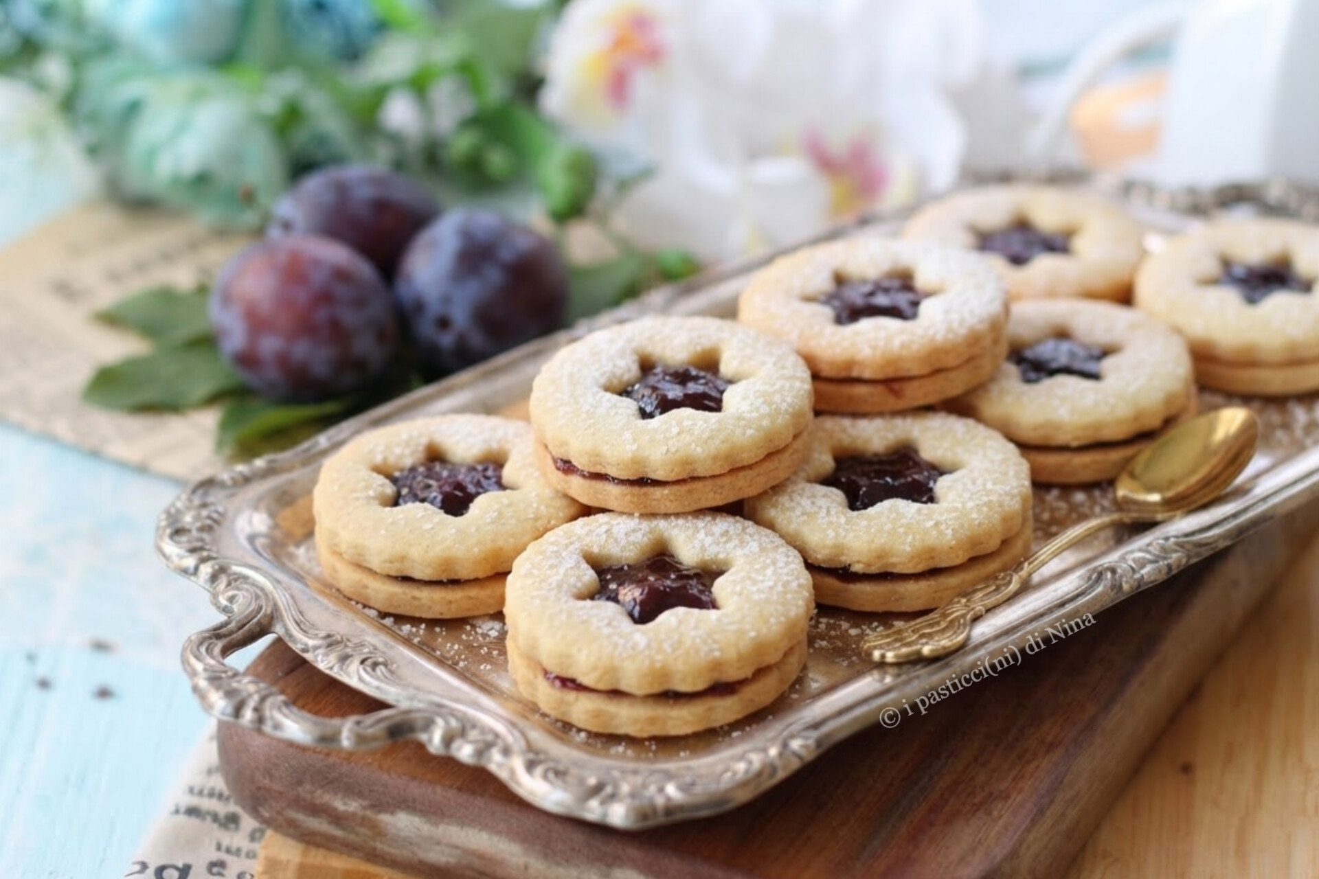 Biscotti Linzer con confettura di prugne ricetta originale i pasticcini di Nina