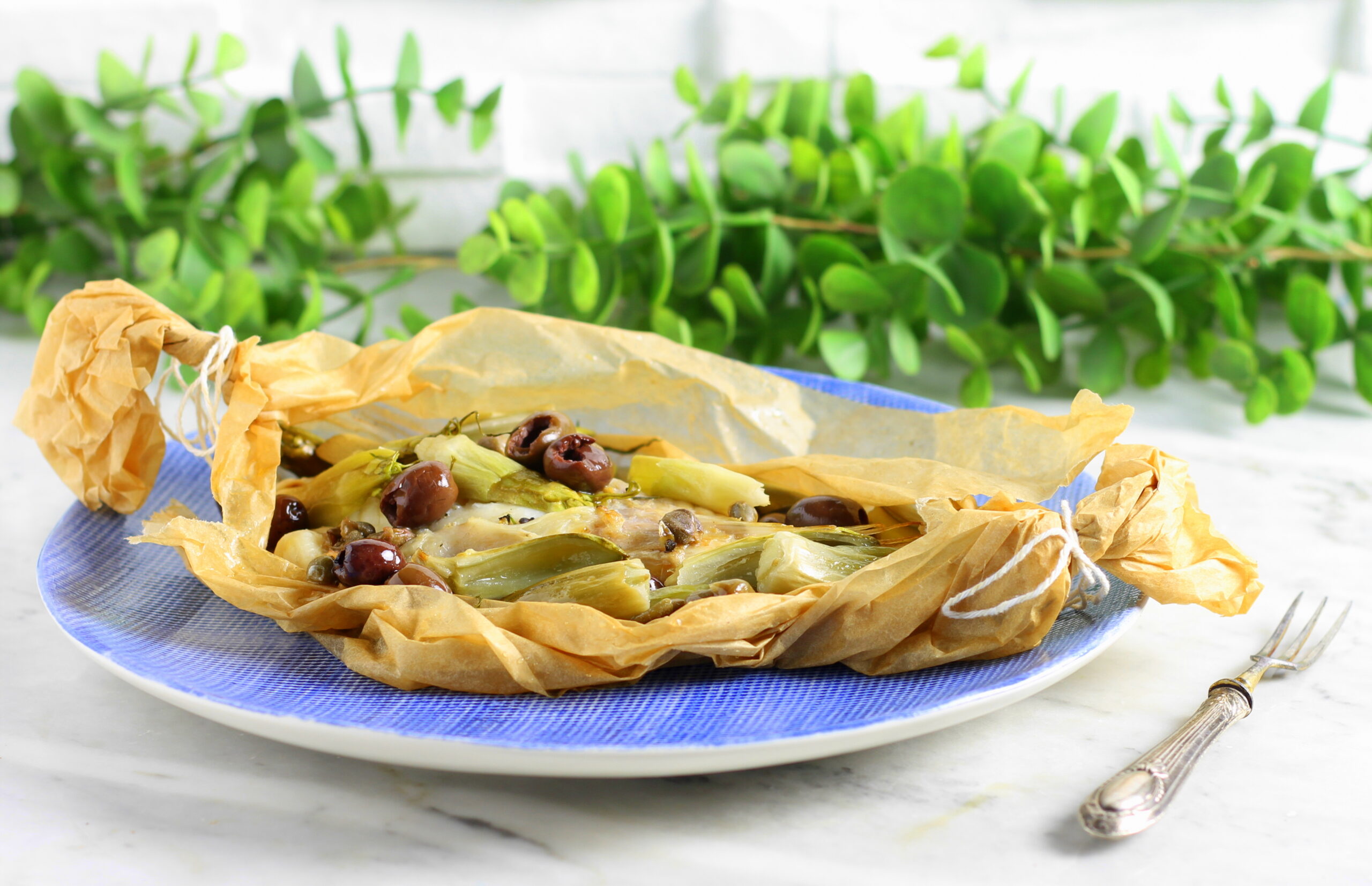 Rana pescatrice con puntarelle al cartoccio