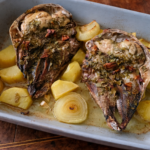 Testina di agnello al forno con patate e cipolla