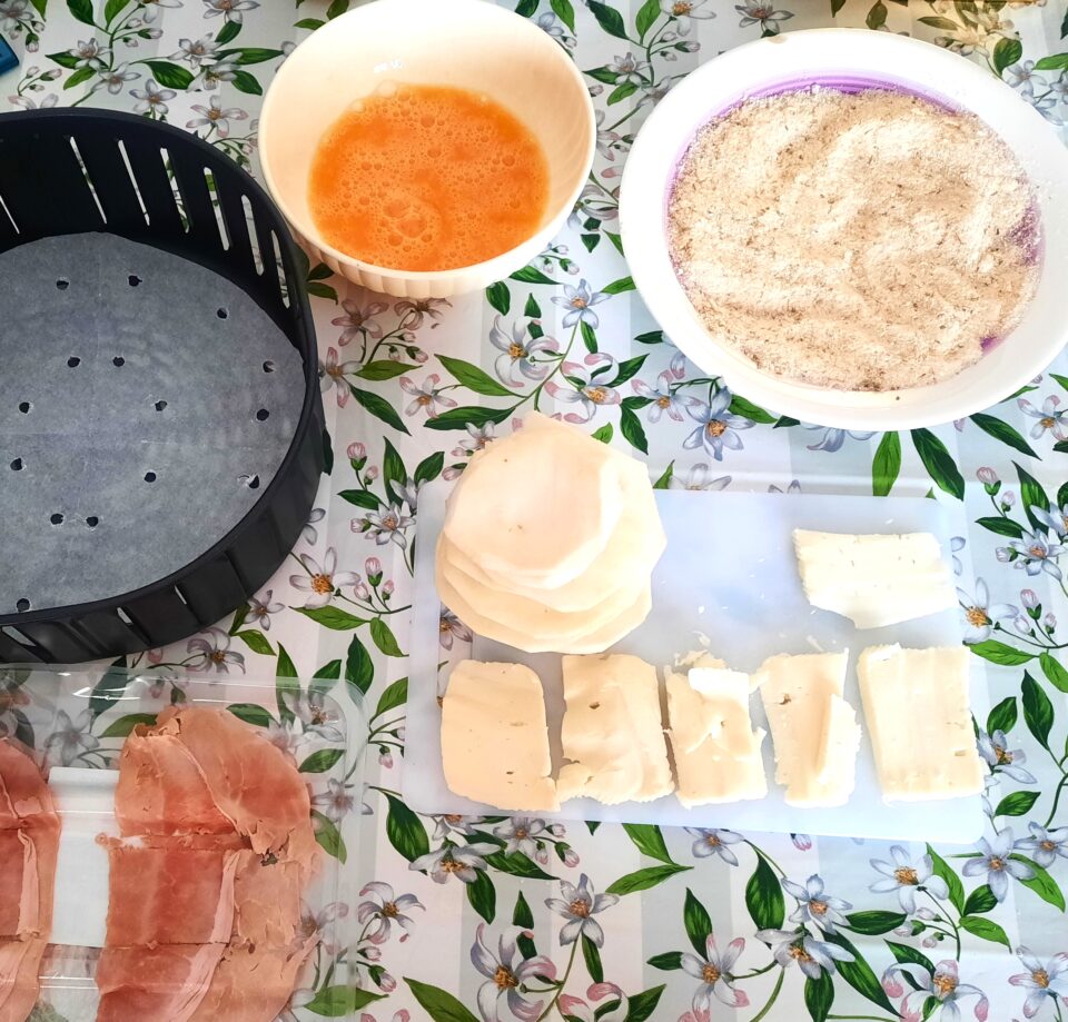 Medaglioni di melanzane prosciutto e formaggio in friggitrice ad aria