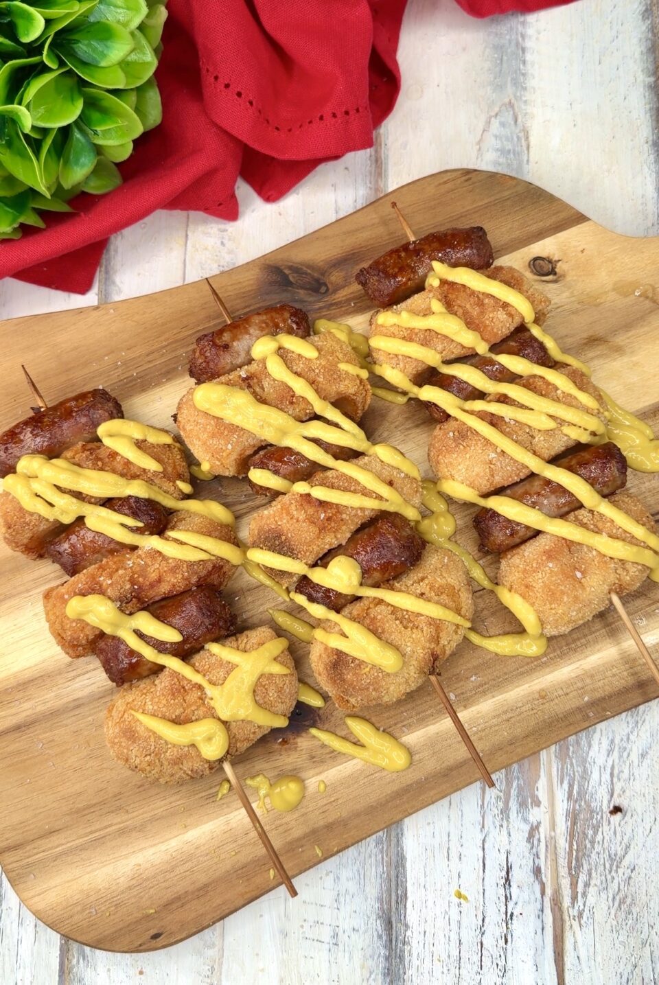 Spiedini di crocchette e salsiccia in friggitrice ad aria