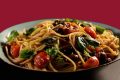 Spaghetti alle olive e pomodori