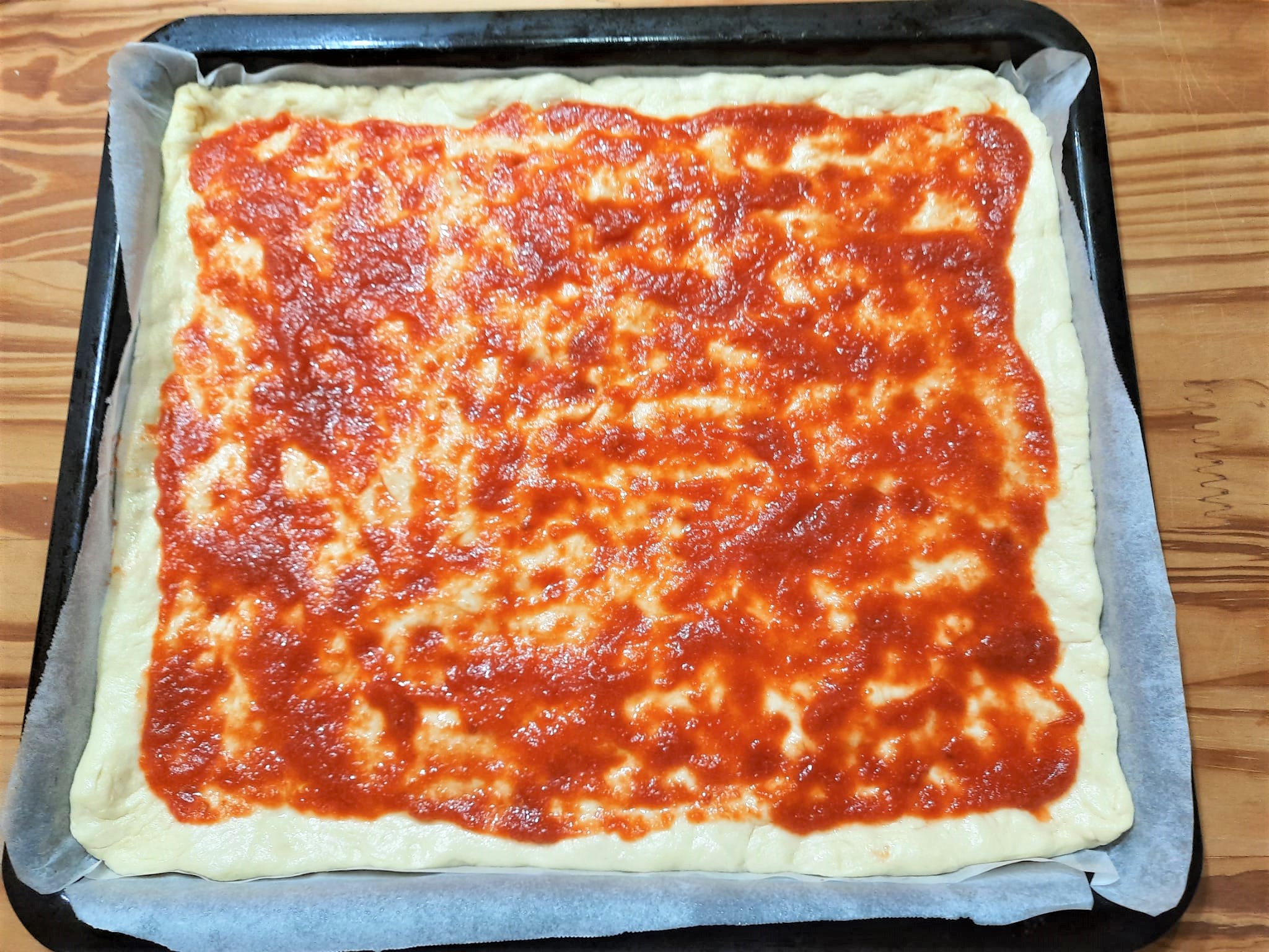 Pizza rucola pomodorini e prosciutto crudo