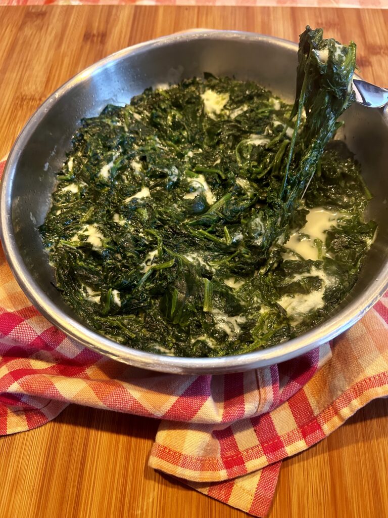 Spinaci saltati in padella con parmigiano e mozzarella