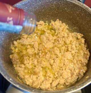 Polpa di salmone fresco in cottura sfumata con Cognac