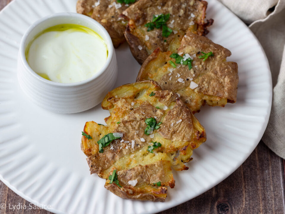 Patate schiacciate al Parmigiano