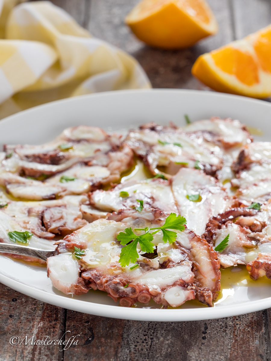 Carpaccio di polpo all'arancia, ricetta polpo in bottiglia con video
