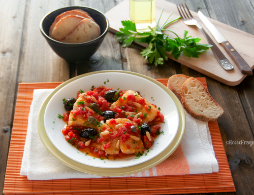 Filetti di Baccalà al  pomodoro  e olive nere