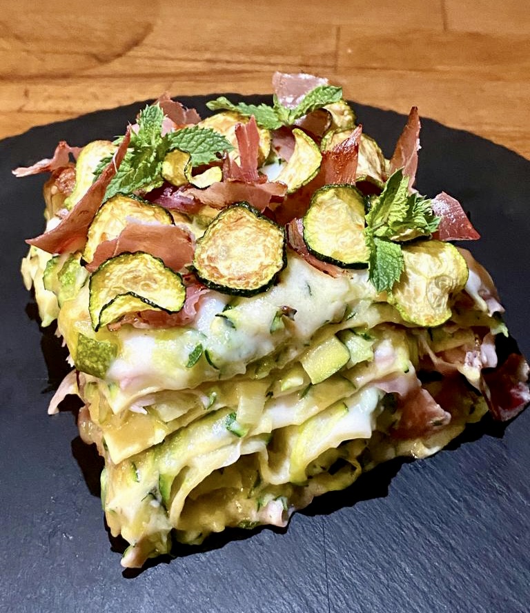 Lasagne con speck, zucchine e provola dolce.