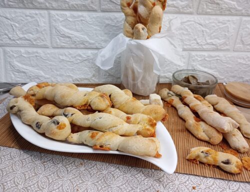 Torciglioni con formaggio e olive