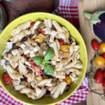 Pasta fredda con melanzane, pomodorini e primosale